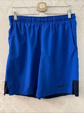 Nike Men’s Royal Blue Athletic Shorts with Black Swoosh